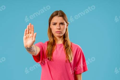 Preview: Uninterested Serious Woman Disapproving No Sign. Denying, Rejecting, Enough, stop crossing hands sig