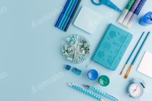 Preview: Blue and Green School Supplies Flat Lay