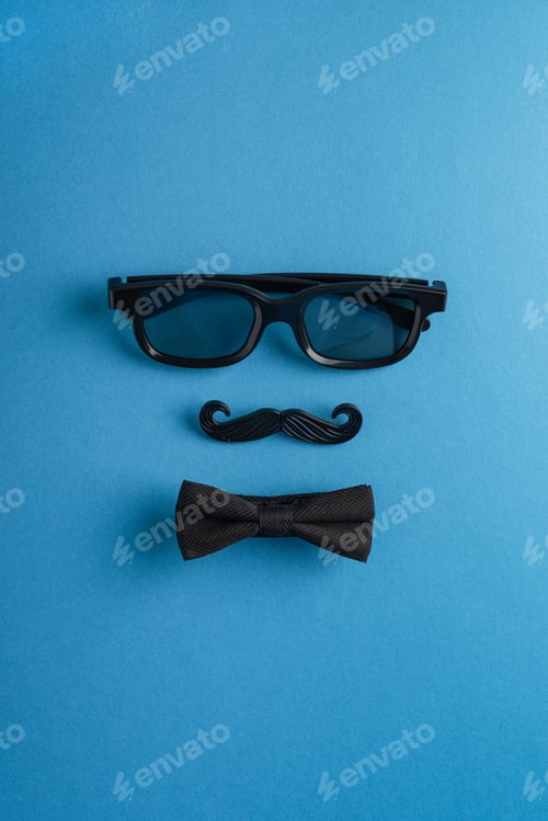 Preview: Father's Day concept with glasses mustache and bow tie on blue