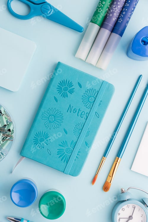 Preview: Blue and Green School Supplies Flat Lay