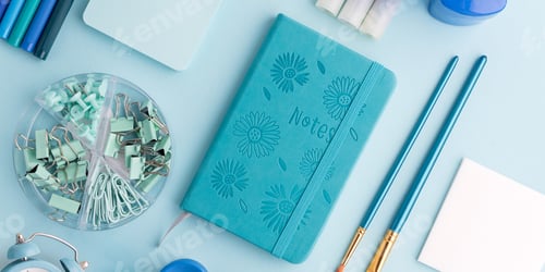Preview: Blue and Green School Supplies Flat Lay