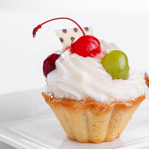 Preview: Delicious Fruit Tart Topped with Whipped Cream and a Red Cherry