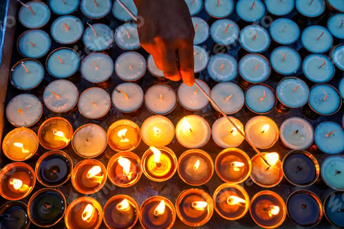Preview: Devotees light earthen lamps during Saga Dawa
