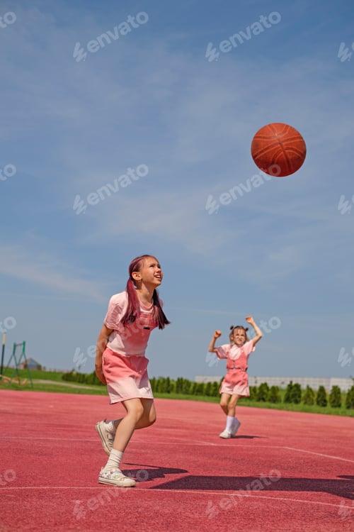 Preview: The child makes a strong powerful ball throw into the ring.