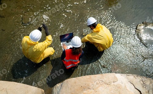 Preview: Group of scientists in protective suits are collecting water samples