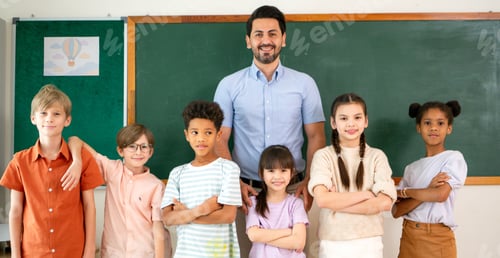 Preview: Confident diverse students and teacher posing together in an international classroom