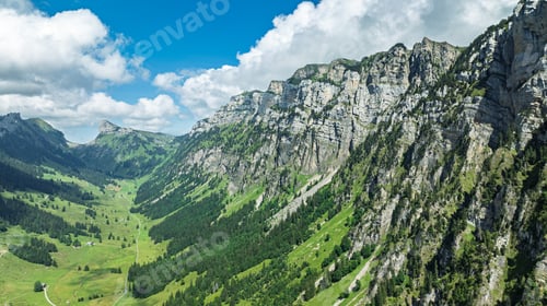 Preview: Scenic Alpine Valley Landscape with Rugged Limestone Peaks in the Swiss Alps of Switzerland