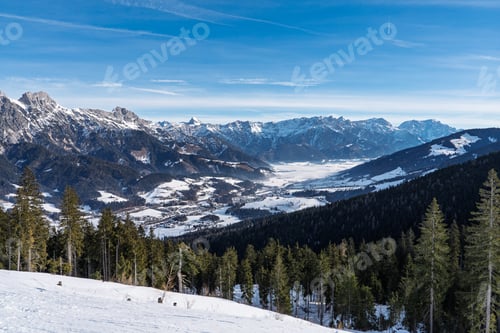 Preview: Panoramic View of Snowy Alpine Mountains and Valley in Saalbach Hinterglemm Austria Winter
