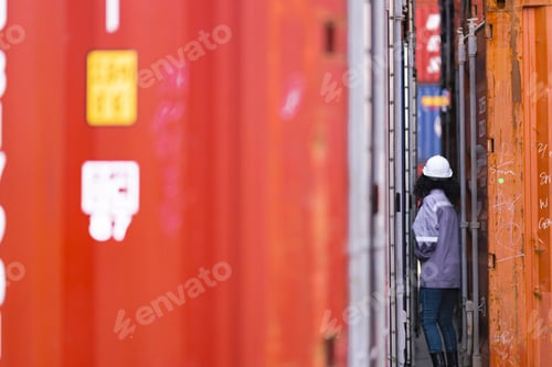 Preview: Asian Woman Logistics Workers Walking to Check Container. Operations at a Busy Shipping Container Ya