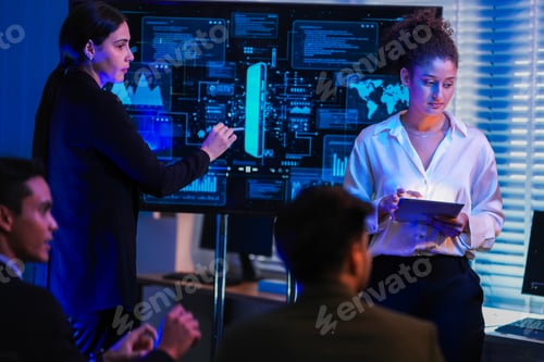 Preview: Professional team engaged in a high-tech corporate AI project review, analyzing digital application