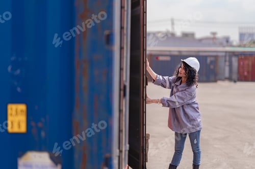 Preview: Asian Woman Logistics Workers Walking to Check Container. Operations at a Busy Shipping Container Ya
