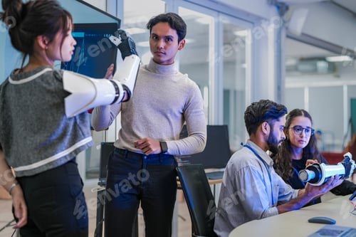 Preview: Robotics engineers testing a cybernetic prosthetic arm prototype and analyzing real-time performance