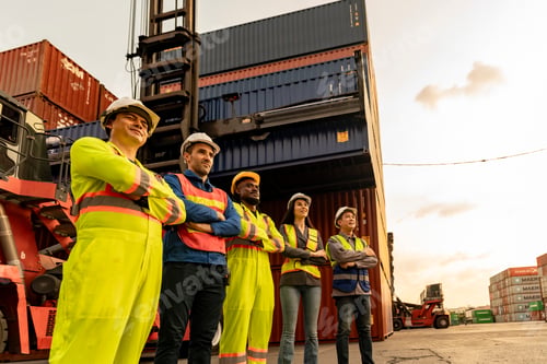 Preview: The men and women container workers in the warehouse stand together as a team, showing their joy and