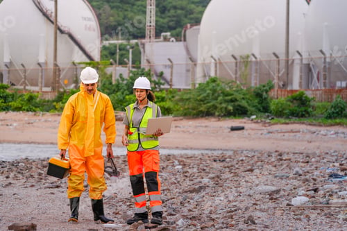 Preview: Environmental scientists conduct field assessment along a polluted coast, carrying lab tools and rec
