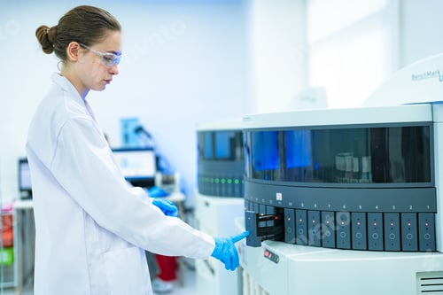 Preview: A clinical scientist initiates a batch test on a high-throughput immunoassay analyzer, loading patie