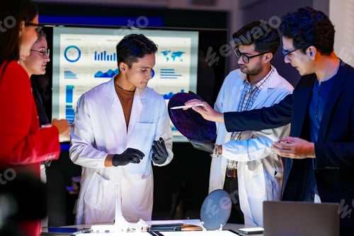 Preview: Engineering team collaborating in a cleanroom to implement advanced lithography precision, boosting