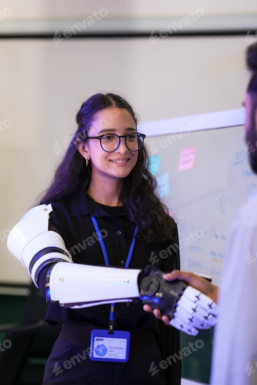 Preview: A cheerful female AI developer shaking hands with a cybernetic prosthetic arm prototype to verify de
