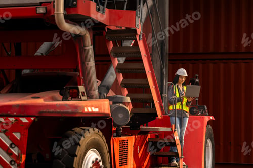 Preview: Two logistics workers man and woman discuss operations at a busy shipping container yard. successful