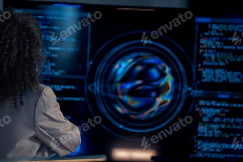 Preview: Black female programmer types on a keyboard surrounded by glowing monitors showing real-time code in