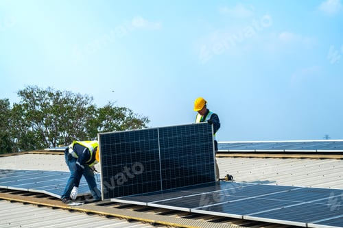 Preview: A professional technician in safety gear standing on a rooftop, preparing electrical wiring for a so