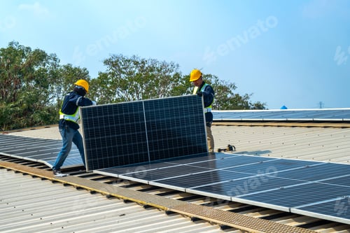 Preview: A professional technician in safety gear standing on a rooftop, preparing electrical wiring for a so
