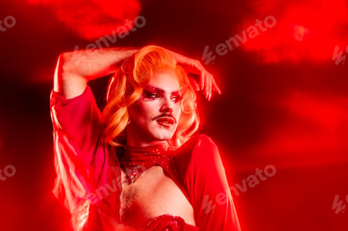 Preview: Drag Queen Portrait With Red Light Highlights in Studio Setting at Night