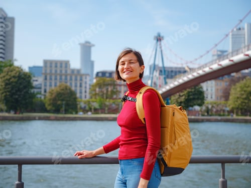 Preview: Tourist woman explores modern Frankfurt,
