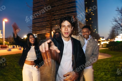 Preview: Diverse group of friends having fun at night