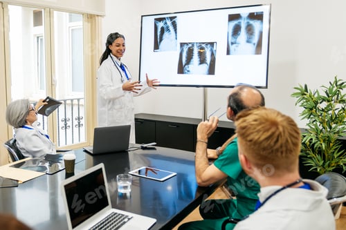 Preview: Medical team collaborating during a hospital conference