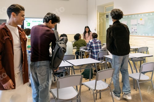 Preview: Diverse students gathering in high school classroom