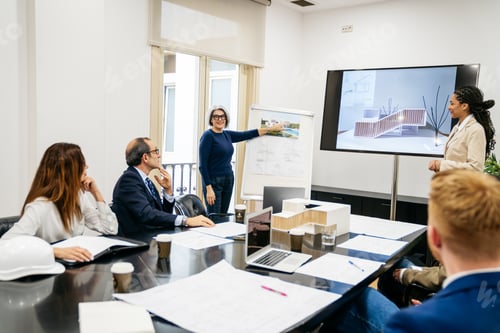 Preview: Real estate business leaders discussing new architecture project