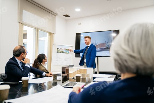 Preview: Business leaders discussing real estate development project
