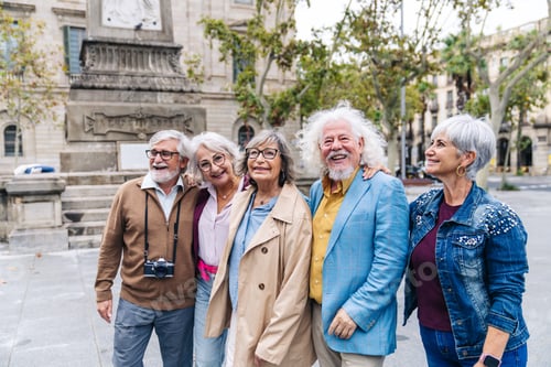Preview: Group of senior friends enjoying city park travel