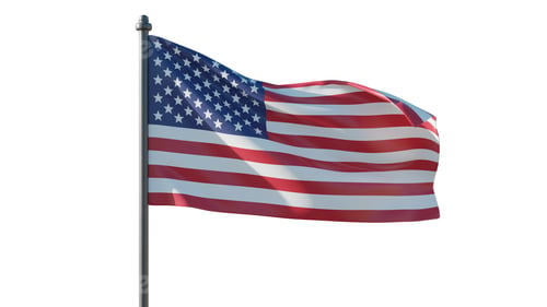 Preview: United States national flag waving in wind against clear bright sky on sunny day