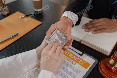 Preview: Legal corruption and bribery concept showing illicit cash exchange during contract negotiation in a