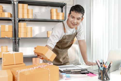 Preview: Ecommerce startup business model with entrepreneur preparing goods for delivery, symbolizing teamwor
