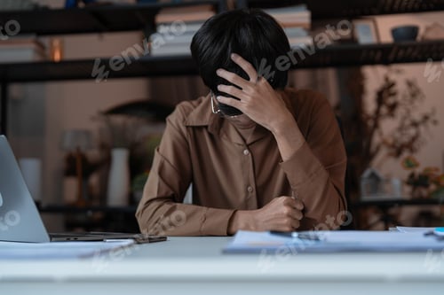 Preview: Stressed Tired Male Employee Sitting at Desk in Company Office