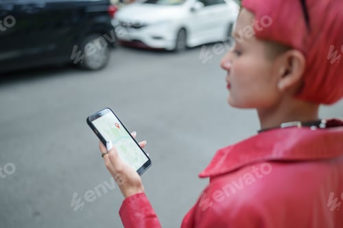 Preview: Traveler Gen z girl leather fashion with punk Asian woman tourist in city street searching location
