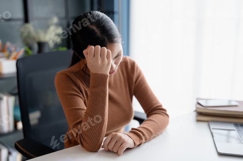 Preview: Stressed Asian Businesswoman Burnout tired with headache in office