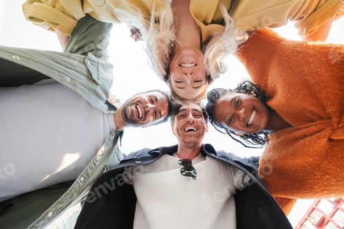 Preview: Joyful friends sharing laughter and smiles in a cheerful circle during a sunny gathering moment