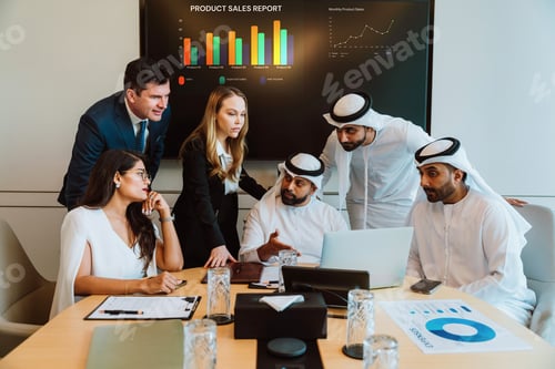 Preview: Diverse business team collaborating on project during meeting