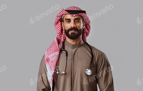 Preview: Saudi arabian doctor smiling, holding digital tablet for healthcare