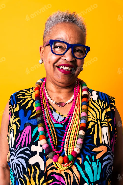 Preview: Senior black woman smiling, vibrant style and personality