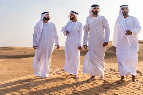 Preview: Arab men friends bonding in dubai desert dunes
