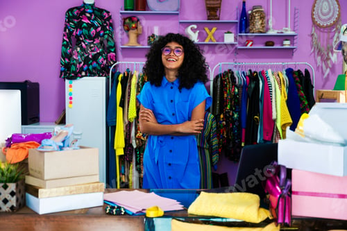 Preview: Beautiful young hispanic woman managing her home e-commerce business from home