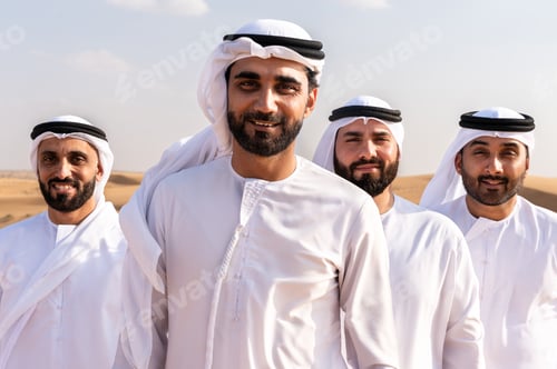 Preview: Emirati arab friends bonding, smiling in dubai desert