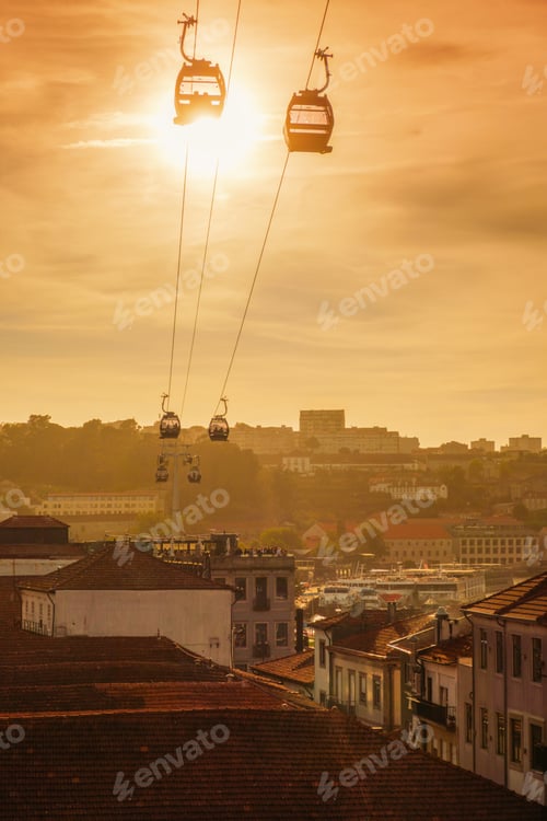 Preview: Teleferico de Gaia cable car silhouettes over the scenic city