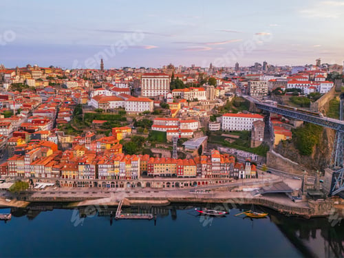 Preview: Drone view of Ribeira in Porto with Dom Luis I Bridge and rabelo boats