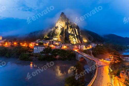 Preview: Illuminated Sisteron Citadel at blue hour in Provence, France