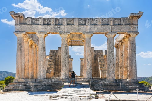 Preview: Woman visiting ancient Temple of Aphaia, Aegina, Greece